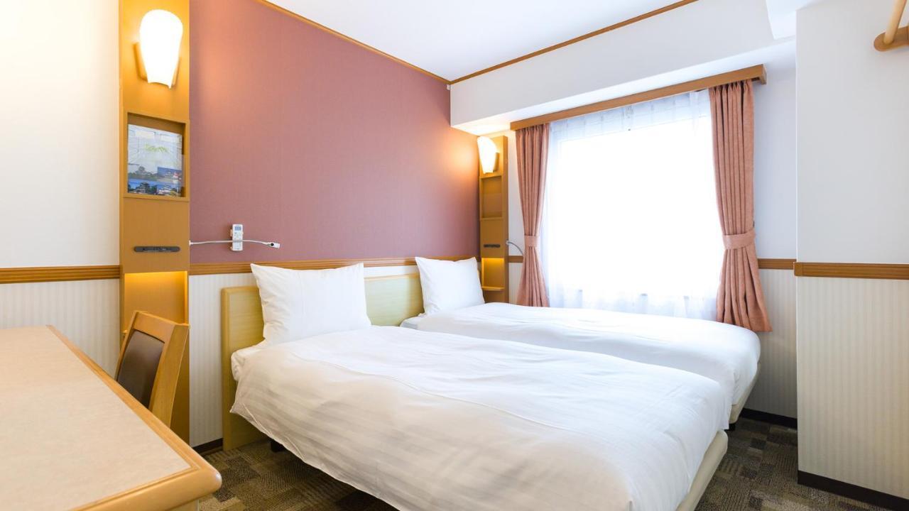 Toyoko Inn Tokyo Shinagawa-Eki Takanawa-Guchi Екстериор снимка