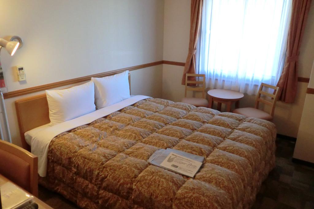 Toyoko Inn Tokyo Shinagawa-Eki Takanawa-Guchi Екстериор снимка